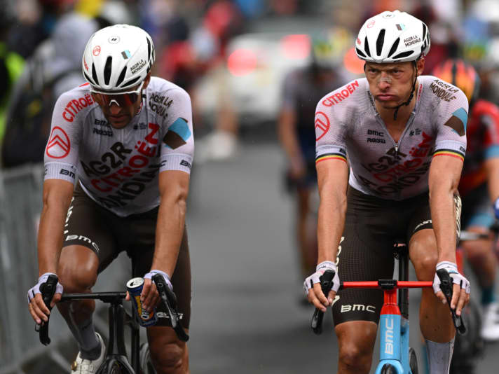 In direct comparison to Oliver Naesen's Teammachine (right), you can see that the front of Greg van Avermaet's new BMC is much slimmer. You can also see the prototype's widely flared fork legs.