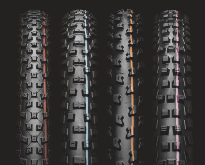   From left to right: Red corresponds to Addix Speed and is particularly suitable for cross-country riders. A blue stripe means Addix Speedgrip - particularly suitable for all touring riders. Tyres with orange stripes have the new Soft compound. Tyres with a purple stripe have the new Addix Ultrasoft rubber.