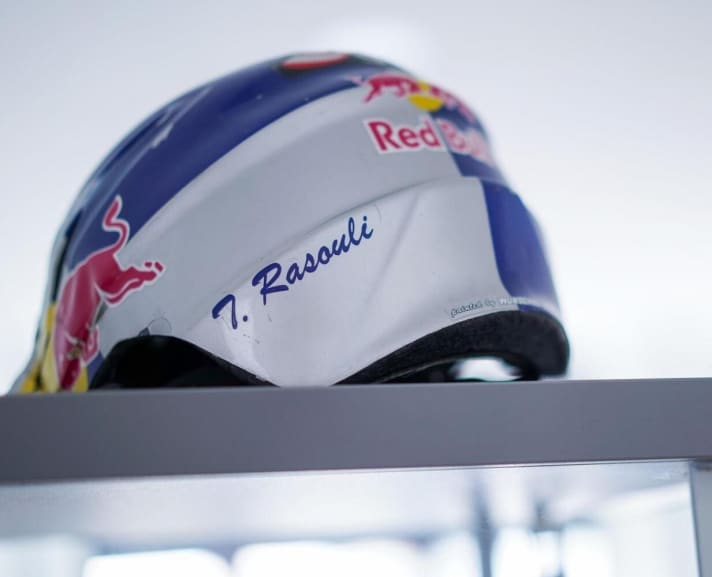   One of Tarek's old helmets, which are on display in a showcase in the office.