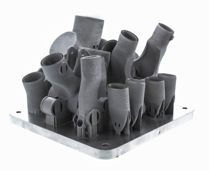   A laser melts around 1000 layers of titanium powder on top of each other until the sleeves are ready.