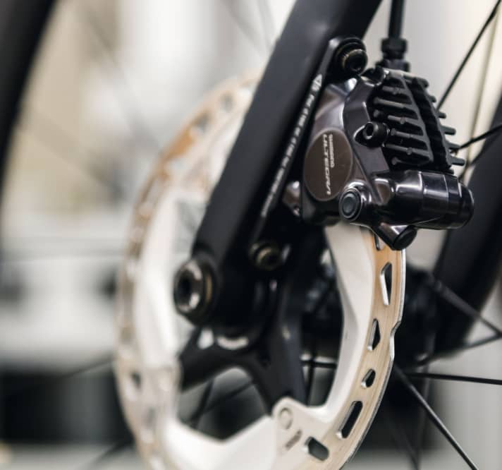 Older Shimano discs are susceptible to grinding noises, only the latest generation eliminates this