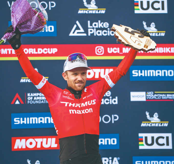 Mathias Flückiger on the podium in the Cross Country Men Elite, XCO, at the UCI Mountain Bike World Series