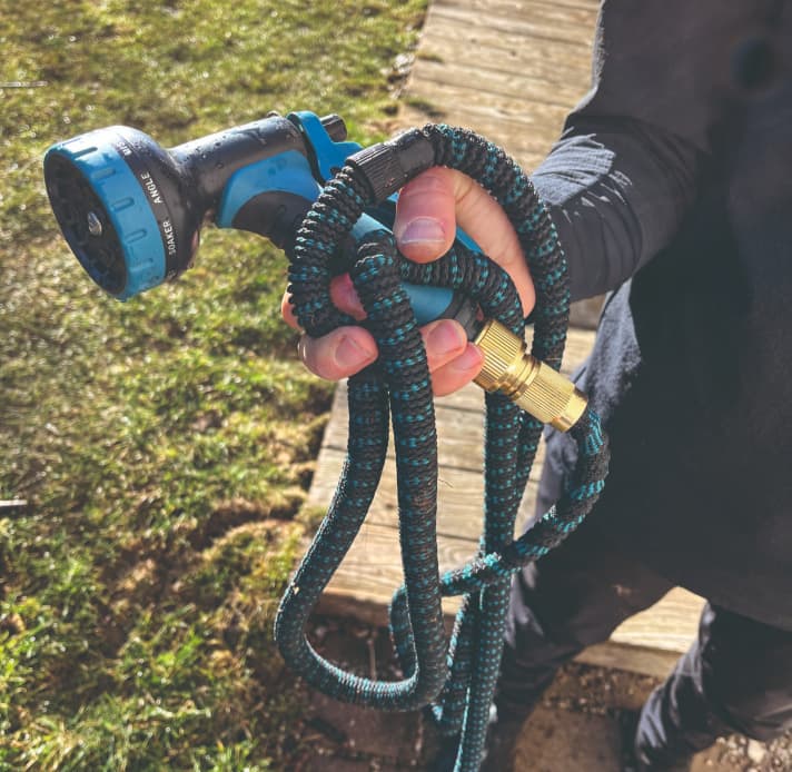 Shower head with flexible garden hose.
