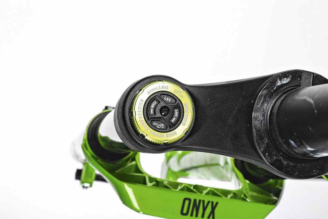 There is no air pressure recommendation on the fork. The setup guide on the DVO website is all the more comprehensive.