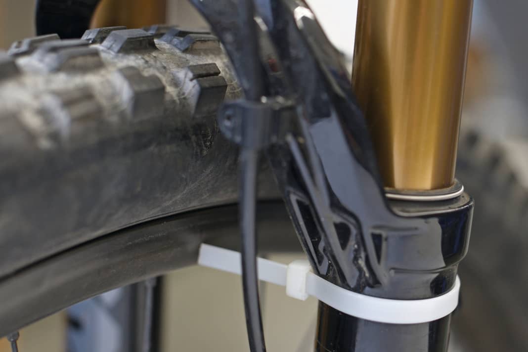 Concentricity: Using a cable tie as an aid, the concentricity can be easily checked on the installed wheel. If there are large lateral run-outs, the main thing to look for is the cause. Is a spoke loose or the rim dented?