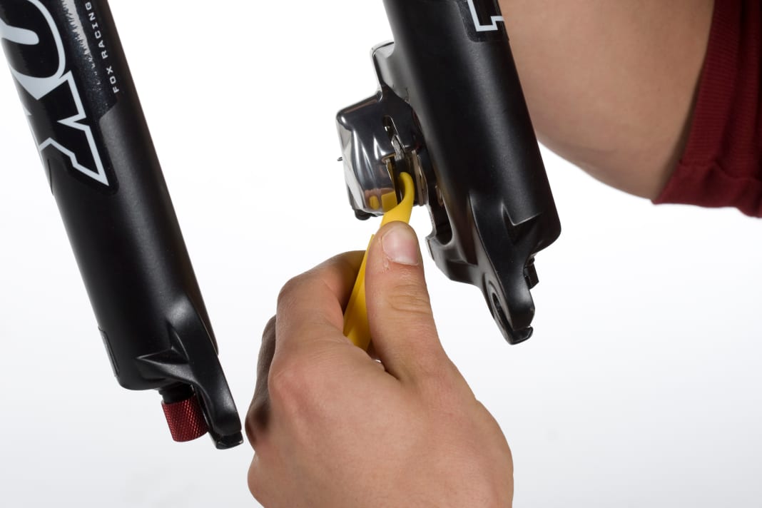 After removing the wheel, push the pads all the way back with a sturdy tyre lever.