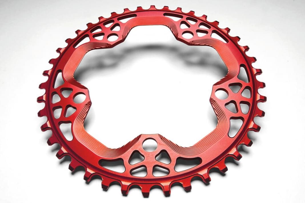 Absolute Black XX1 Style Shimano

www.absoluteblack.cc, price: from 49,99 Euro, weight: from 34 grammes

 Single chainrings for 64 or 104 millimetre bolt circle. Available in red or black, with 26, 28, 30 teeth (64 mm) or 32, 34, 36, 38 teeth (104 mm). Also available as Sram Direct-Mount.