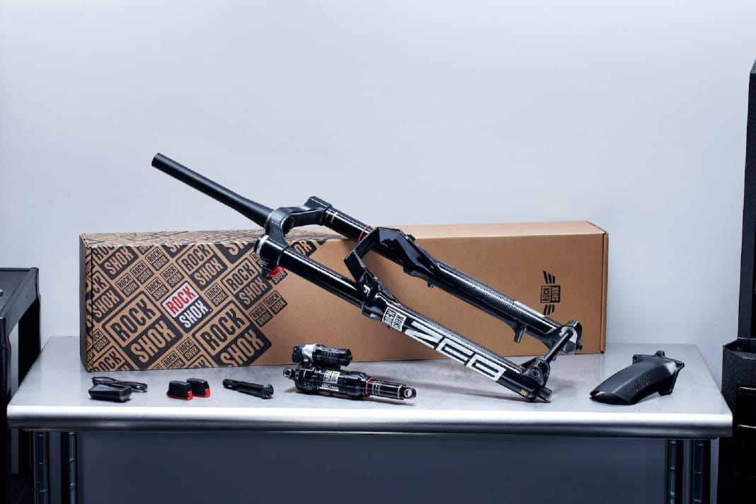 The Rockshox Flight Attendant upgrade kit includes fork, shock, fender, pedalling sensor, two batteries and a battery charger. 