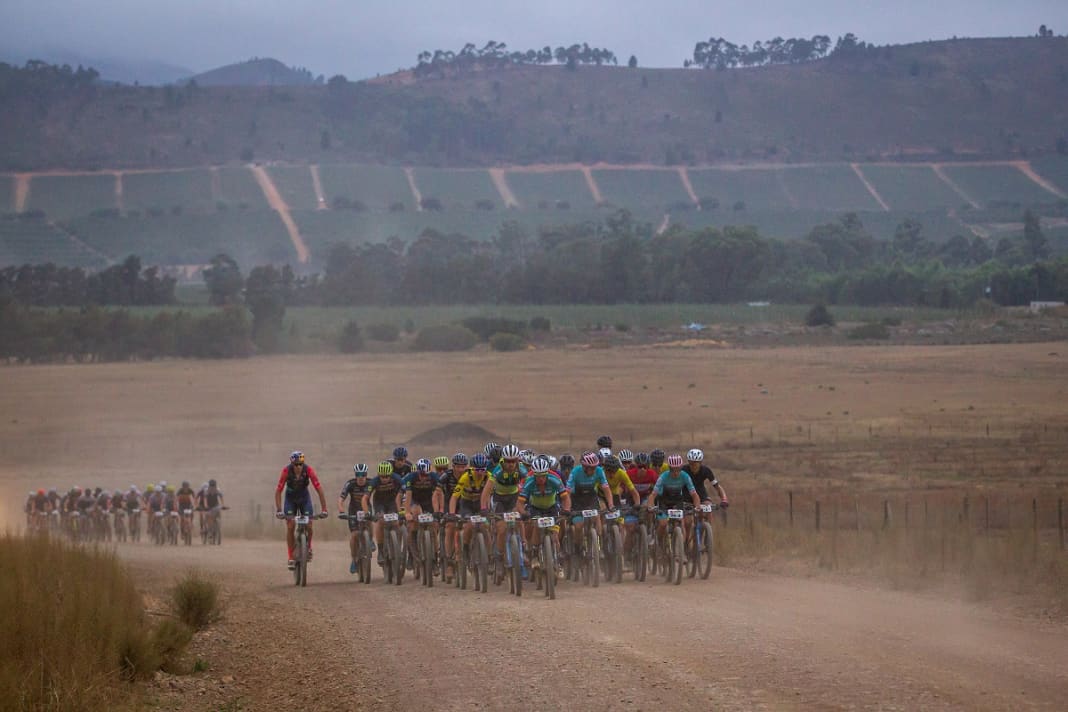 Before the heat of the day sets in, the athletes are already on their way to master each day's stage