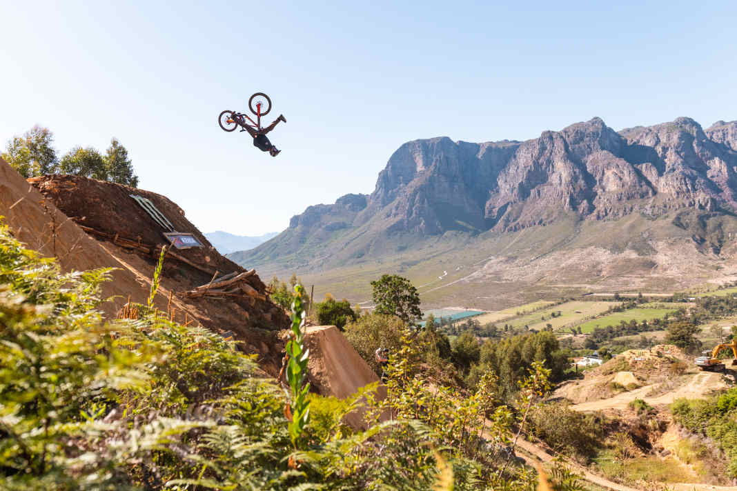 The legendary step-up! Here Matt MacDuff spins upwards in the "Spread Eagle Backflip".