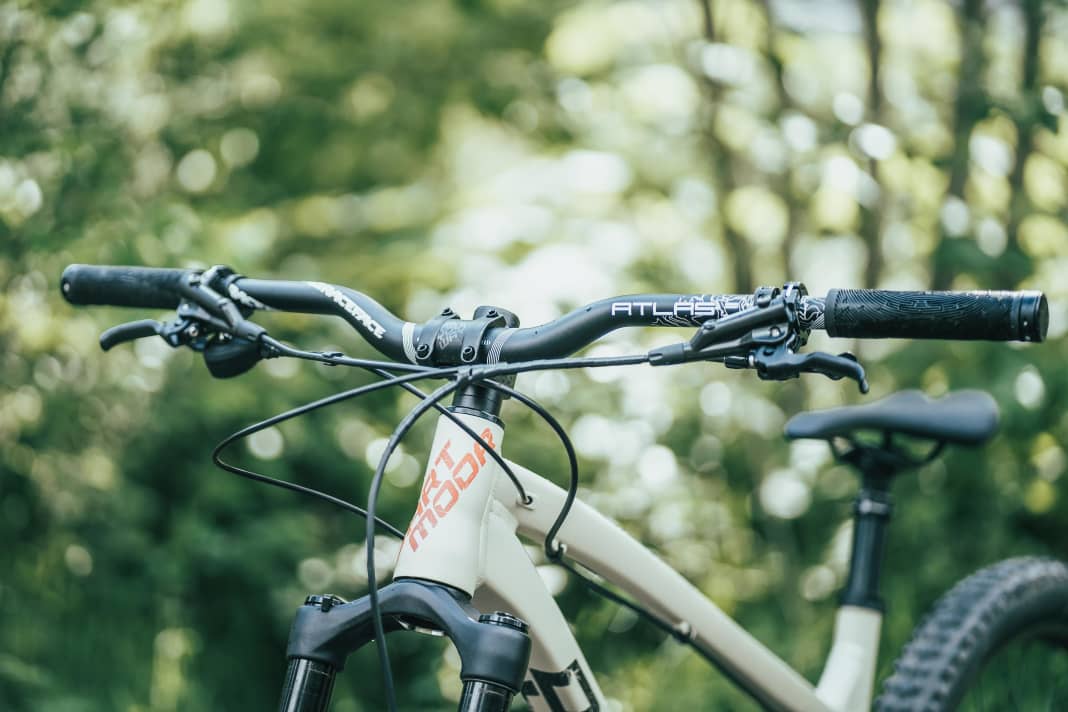 A high front with riser handlebars makes the Dartmoor Primal a specialist for bike park play.