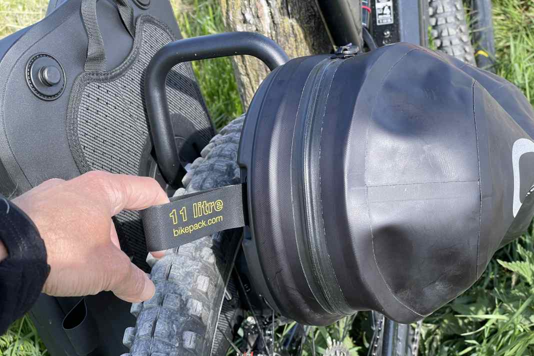 The Quicklock system can be unlocked using this strap and the pack sack can either be removed or rotated and repositioned.