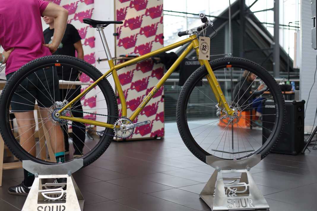 The Sour, featured at Pasta Party 32, combines a single-speed drivetrain with a locally manufactured steel frame and the new 32-inch wheel size.