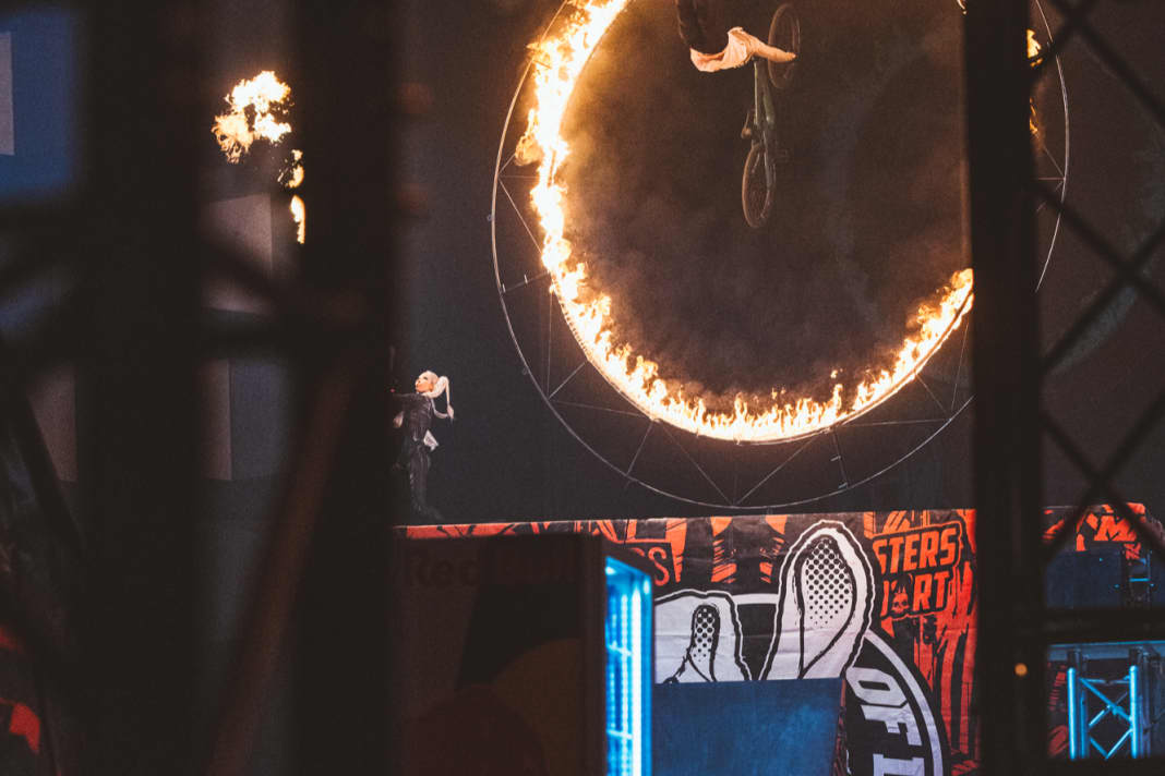 Fire always draws: Adolf Silva flies through a burning ring in Superman.