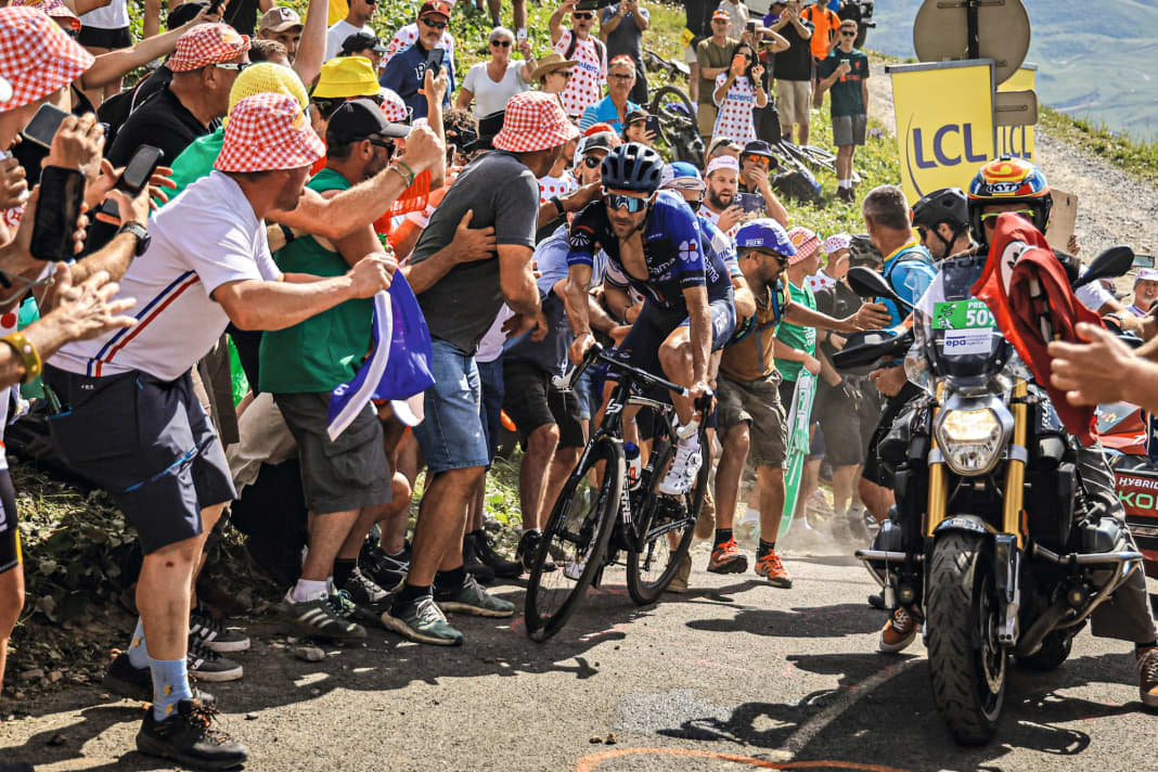 Up close: The proximity of the racers - here Thibaut Pinot - to the fans on the roadside is a fascinating aspect of cycling. And a considerable source of danger.