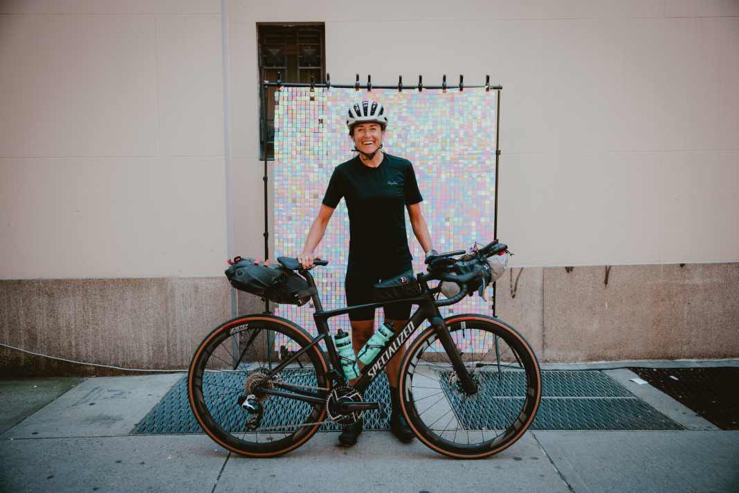 Lael Wilcox and her bike, with which she set the new world record.