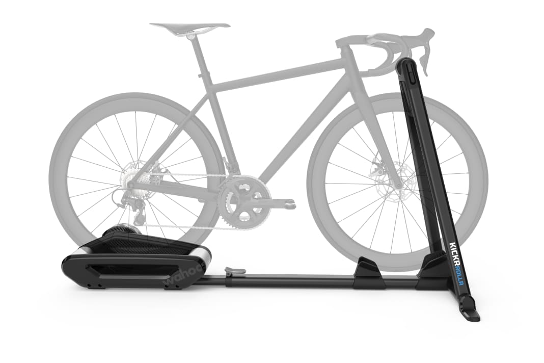 The rear wheel can move freely on the Kickr Rollr's rollers, while the Safety Power Gripper holds the front wheel in place, ensuring safety even when pedalling.