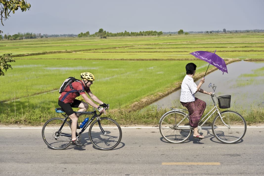 After the mountains, the fourth day takes TOUR author Dres Balmer through rice fields to the Mekong.