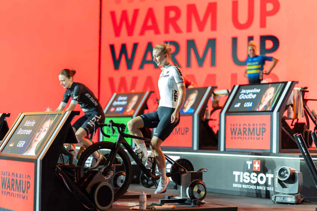 Merle Brunnée (centre) at the Cycling E-Sports World Championships in Abu Dhabi