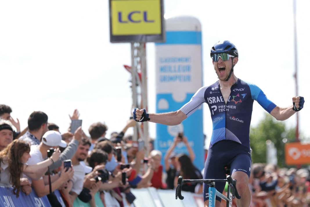 Derek Gee celebrates victory on stage 3.