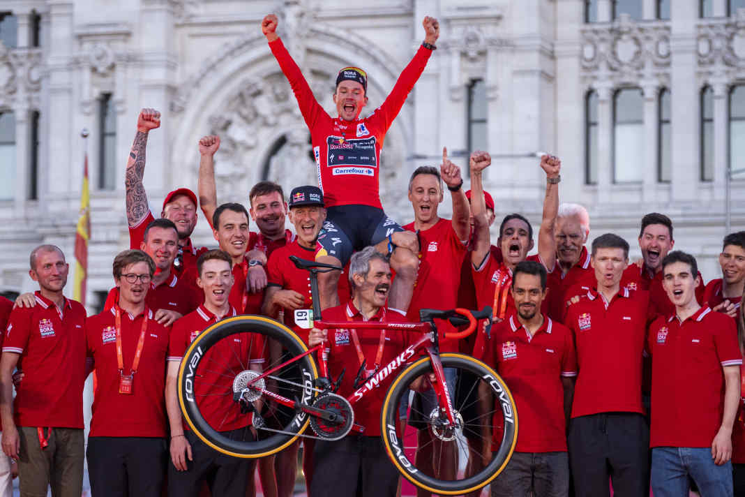 Primoz Roglic and Red Bull-Bora-Hansgrohe celebrate overall victory.