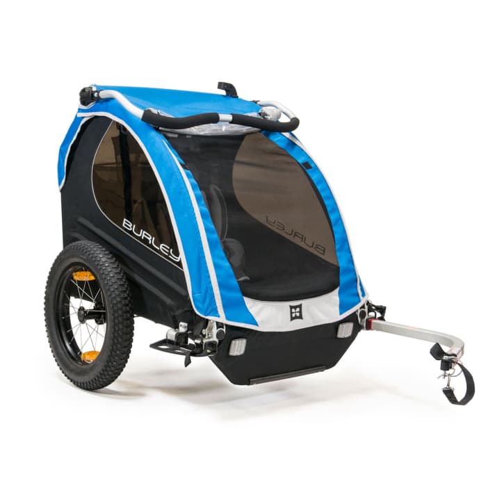   Die dicken 16+ Plus-Reifen erhöhen die Offroad-Tauglichkeit der Burley Kinderanhänger. Den auf dem Foto dargestellten ungefederten Modellen spendieren sie etwas mehr Komfort.