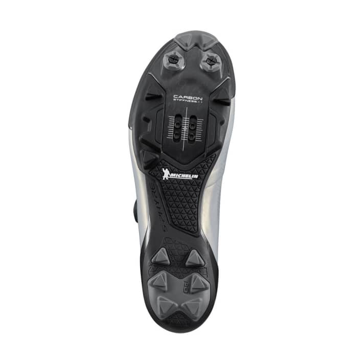   A carbon fibre midsole and the Michelin rubber sole with anti-slip profile and studs are designed to provide stability, good power transmission and a minimum of surefootedness on running passages.