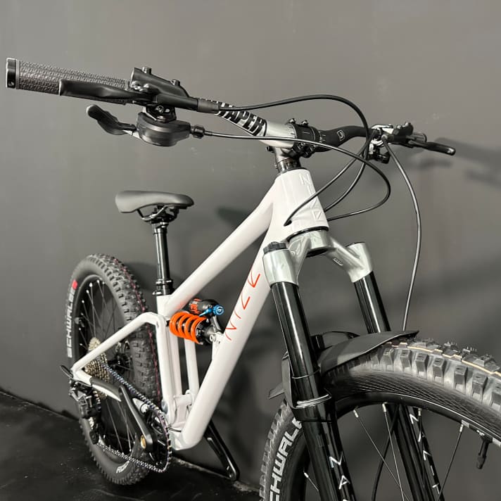 Both air and steel spring shocks fit into the rear of the children's bike from Nize.