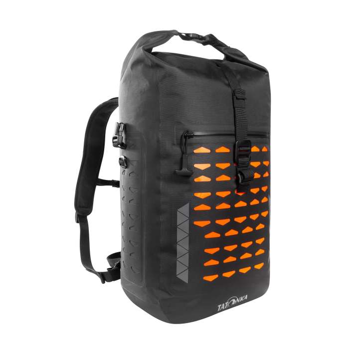 The 30-litre rucksack has a flat front compartment with laser-cut cut-outs, including a reversible sheet in reflective and neon colours. We say: top!