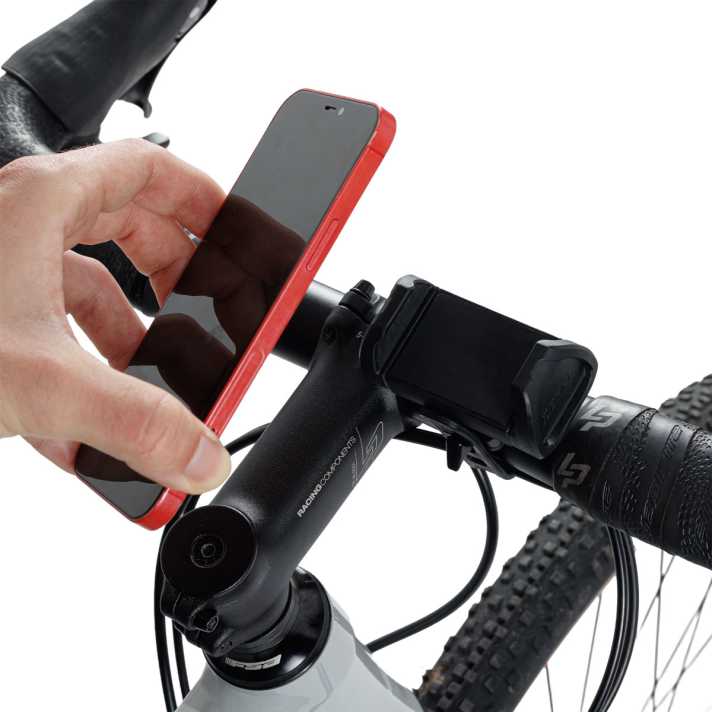 Le smartphone peut être fixé dans la pince en un tour de main.
