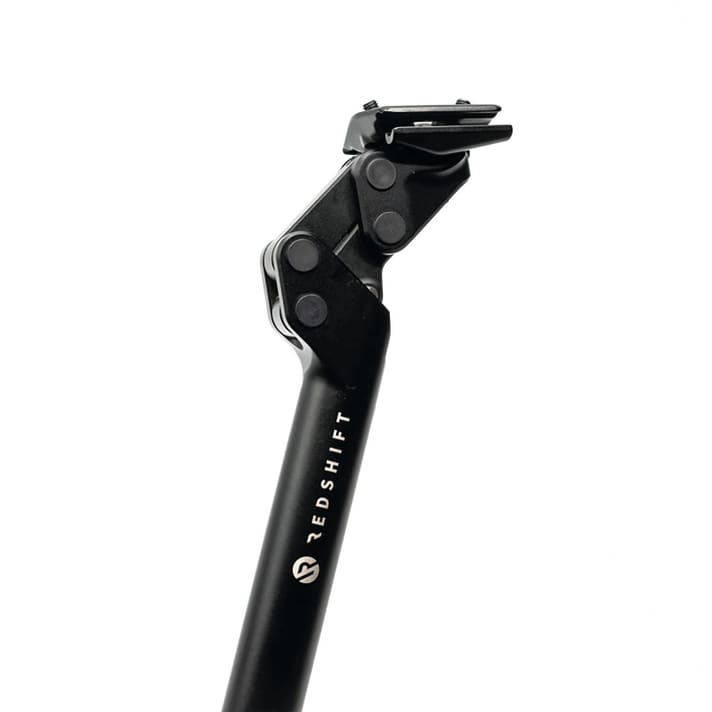 La <a href="https://www.awin1.com/cread.php?awinmid=11768&awinaffid=471469&clickref=T+Redshift+Shockstop+Sattelst%C3%BCtze&ued=https%3A%2F%2Fwww.rosebikes.de%2Fredshift-shockstop-sattelstutze-mit-dampfungselement-2689442" target="_blank" rel="noopener noreferrer">Tige de selle Redshift Shockstop</a>*.