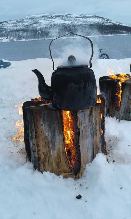Pure romance: freshly brewed tea by an open fire will re-energise even frozen bikers. It's moments like this that stay in your memory.