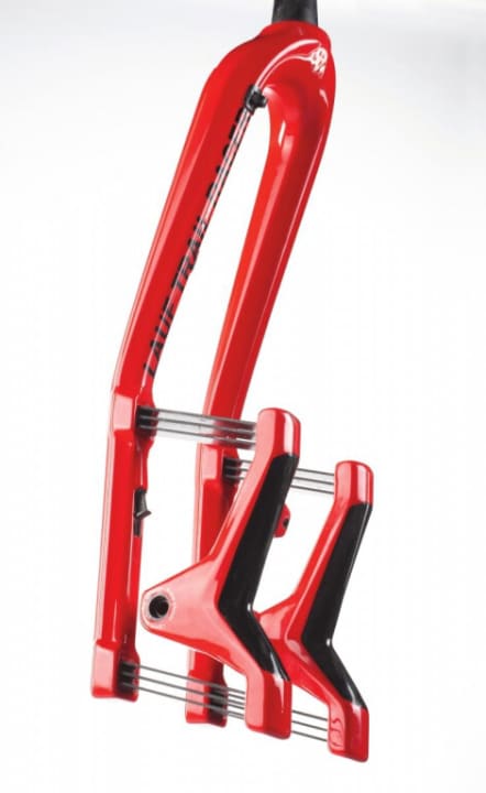   The carbon fork weighs less than 1000 grams. No standard suspension fork can keep up with that.