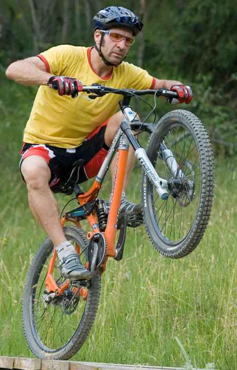   The most common mistake when doing a wheelie: bent arms.