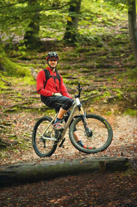   "There's nothing worse than getting wet and then cold. A pair of rain trousers and thick socks will help with soggy, muddy trails. A small mudguard keeps your goggles clear." Peter Nilges