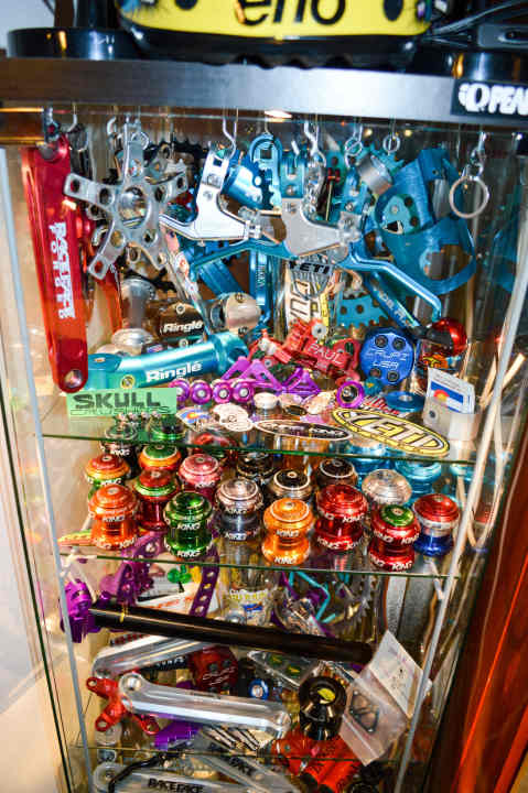 The treasures of the golden tuning era: headsets, cranksets, stems - all sparkling in bright, garish colours.