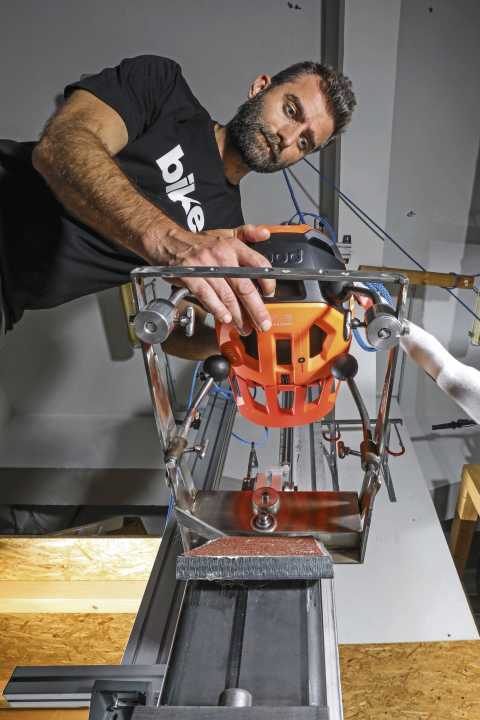 All helmets were tested on the in-house test stand.