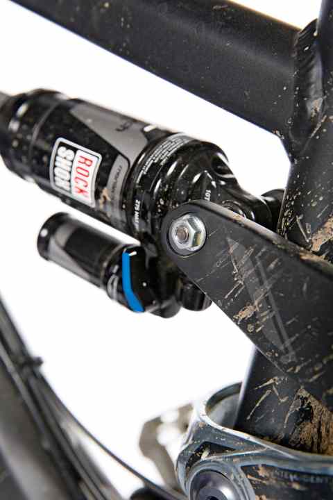   A break in style: The wimpy DIY store nut on the shock mount of the Devinici Spartan doesn't match the otherwise stylish bike at all. Here is a chip that changes the steering angle and bottom bracket height.