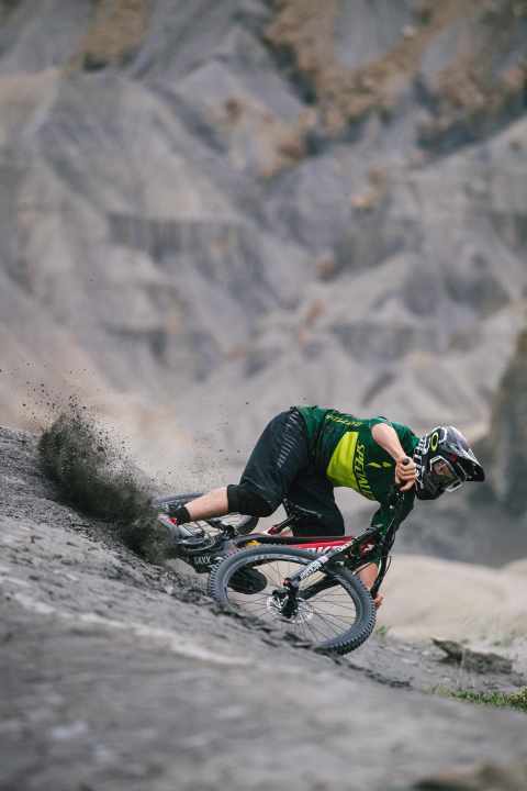   Scratching the corner: Rampage participant Kyle Norbraten changing direction quickly. Powerful brakes are a must on all gravity bikes, especially for use in the park.