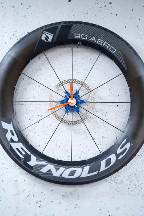   Also pretty: a wall clock made from an aero rim and brake disc.