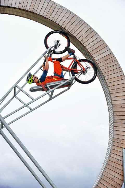   The "O" in the Plose lettering at the summit with funfair hamster bikes: the new South Tyrolean flow trails offer the opportunity to approach biking in the Dolomites from the fun side.