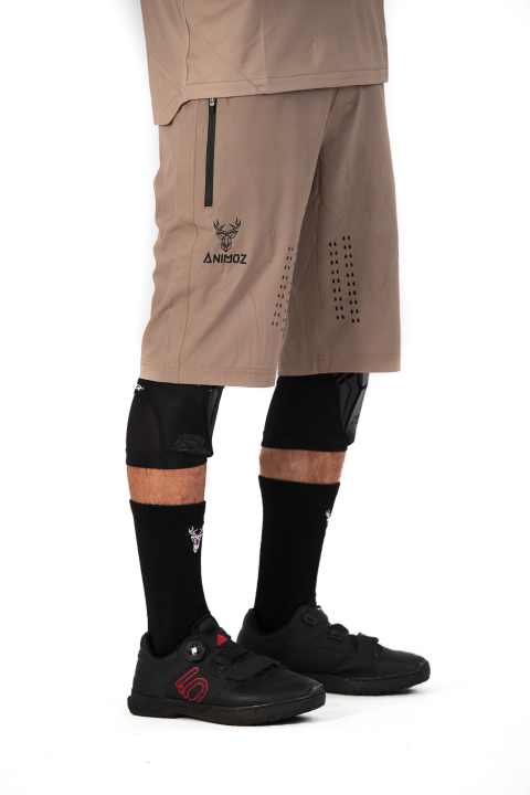   Stay cool: A laser burns the ventilation holes in the trouser legs.