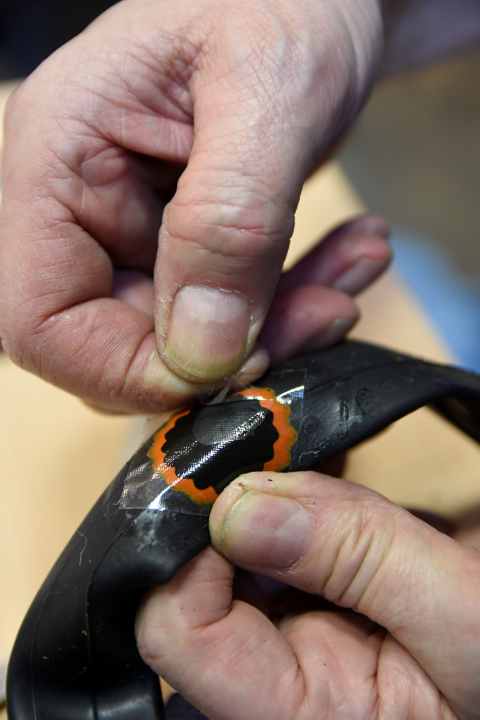 Press the patches firmly with both thumbs and then pull them apart.