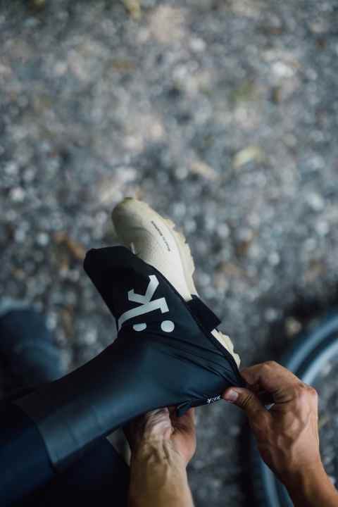 A loop on the back and a Velcro fastener on the sole help you put them on