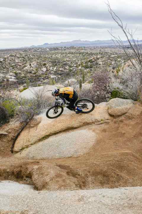 Riding on the edge: Juan makes full use of the natural berm.