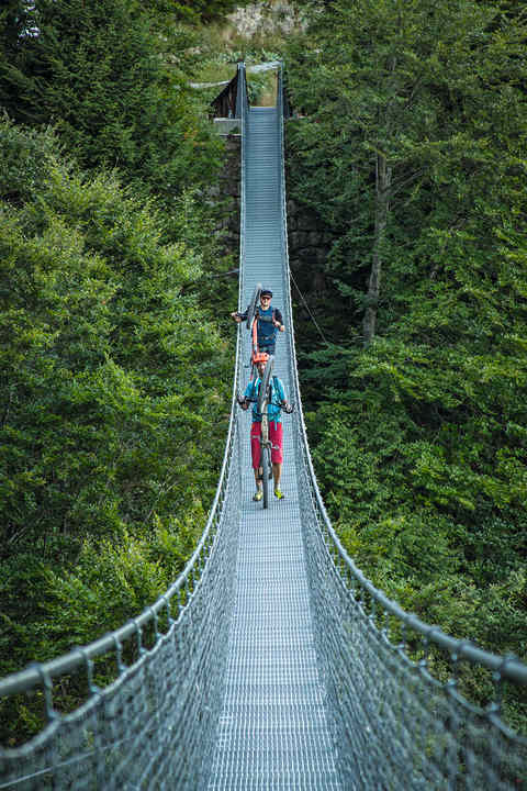 Ponte Avis suspension bridge shortly before stage destination 1, the Rifugio Campogrosso: although this modern-day route is not without its problems.
