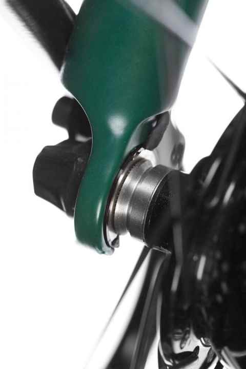 Direct contact from fork to SON dynamo. This trick makes wheel removal easier.