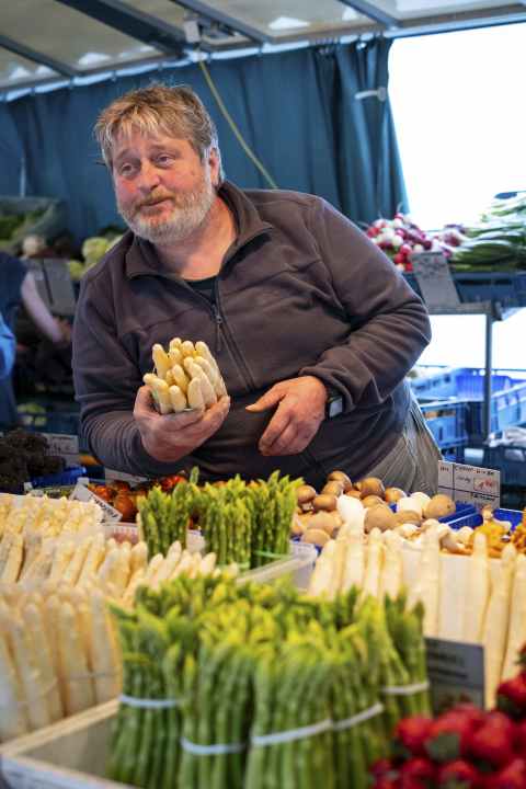 Popular with locals and tourists: the Egger family's vegetable stall at the green market in the centre of Salzburg.