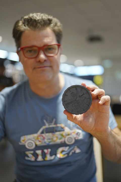 Josh Poertner with a speed chip wax taler for hot waxing the wheel chain