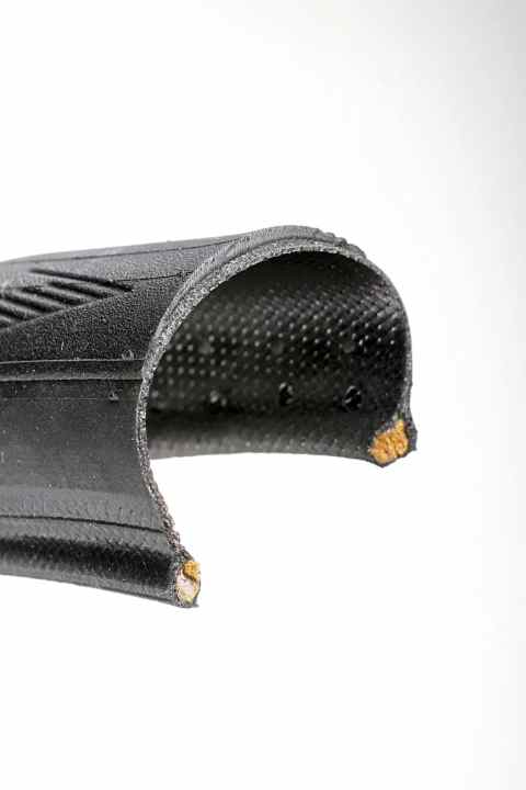 Tubeless tyre: Basically a clincher, but with a more stable tyre foot and inner coating
